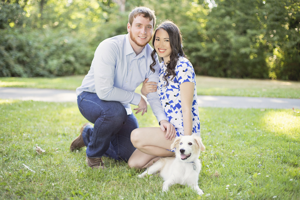 engaged couple with dog