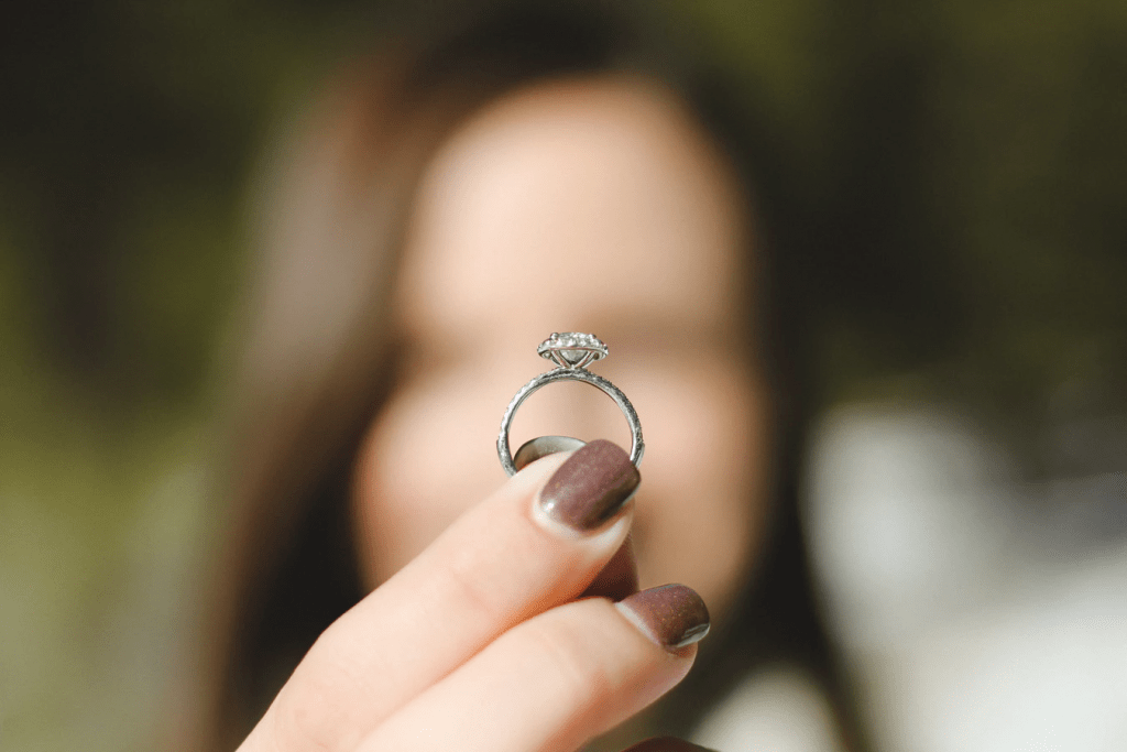 Woman holding a diamond ring